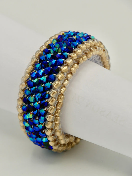 Ponytail Jet Bluish Gold